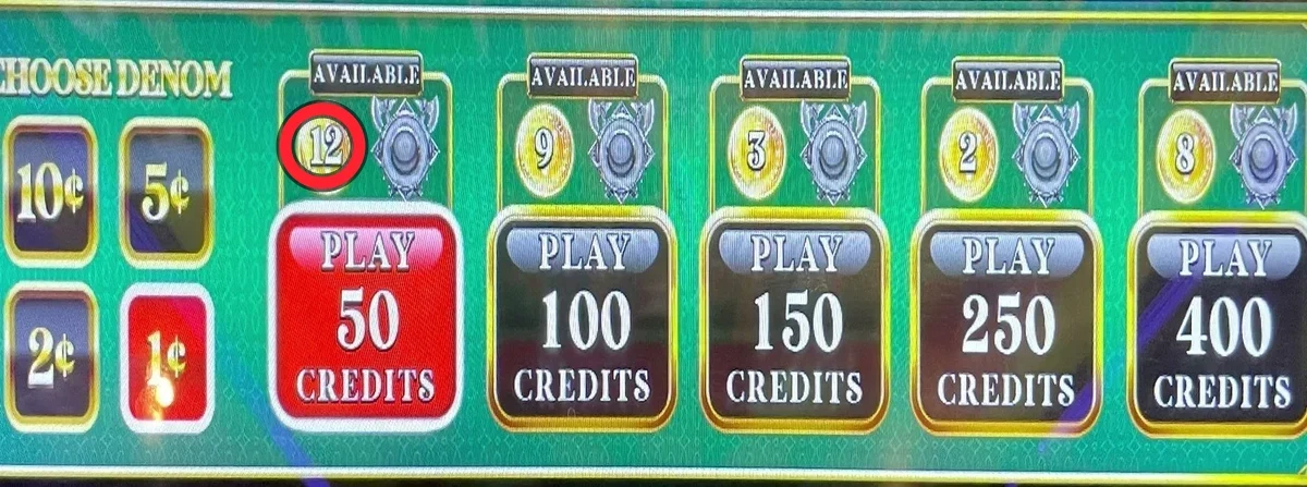 The whole play is on the bet pad: each level prints how many orbs are AVAILABLE — the red ring is on the 50-credit level sitting at 12, with 9 at 100, 3 at 150, 2 at 250 and 8 at 400. That ringed 12 is a live play; it banks just three more orbs to the 15 that fires the bonus.