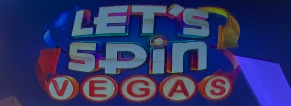 Let’s Spin slot machine cabinet on casino floor
